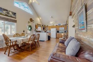 a living room with a couch and a table at Recreational Paradise in Gunnison