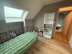 En eller flere senge i et værelse på Maison neuve proche Dole - Forêt de Chaux