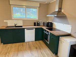 Køkken eller tekøkken på Maison neuve proche Dole - Forêt de Chaux