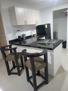 Η κουζίνα ή μικρή κουζίνα στο Apt san gil por dias amoblado