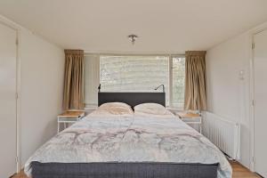 Postel nebo postele na pokoji v ubytování Santos