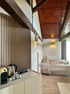 Ένα ή περισσότερα κρεβάτια σε δωμάτιο στο Il Casale della Baronessa