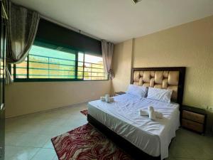 Postel nebo postele na pokoji v ubytování Fes City Luxury Suites - Apartments & Studio
