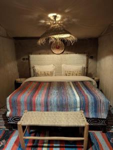 Postel nebo postele na pokoji v ubytování Royale Touareg Tents