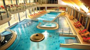 an overhead view of a large swimming pool at VR Spa Apartman in Velence