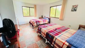 Postel nebo postele na pokoji v ubytování Owl House, Large and comfortable Suite