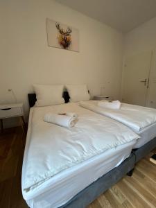 Giường trong phòng chung tại BnbRetreat am Schloss Schwetzingen