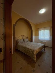 Ένα ή περισσότερα κρεβάτια σε δωμάτιο στο Guzzolini Camere & Relax