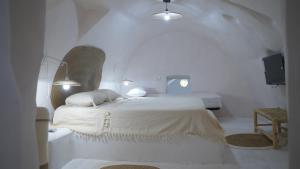 Postel nebo postele na pokoji v ubytování Hotel Sidi Idriss Star Wars