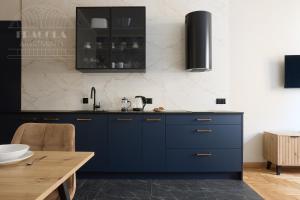 Kuchyň nebo kuchyňský kout v ubytování Art Palace - Fragola Apartments