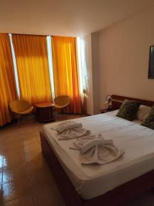 Voodi või voodid majutusasutuse Traian Residence Constanța toas