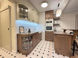 Η κουζίνα ή μικρή κουζίνα στο Apartament przy rzece Lega