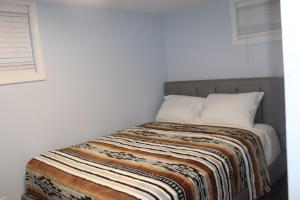 Postel nebo postele na pokoji v ubytování Abby's Lodge