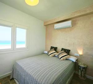 Postel nebo postele na pokoji v ubytování Sea view Apartment