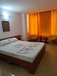 Voodi või voodid majutusasutuse Traian Residence Constanța toas