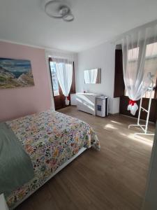 Postel nebo postele na pokoji v ubytování Casa Amarena