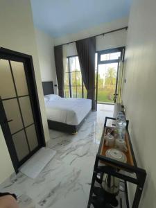 Fotografie z fotogalerie ubytování AJA Homestay v destinaci Pronojiwo + 15 fotografií