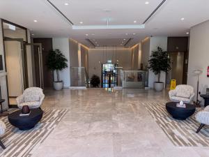 Χώρος καθιστικού στο GRANDE SIGNATURE with Fountain Show and direct Burj Khalifa view with DXB AIRPORT VIP Shuttle option for 6 guests