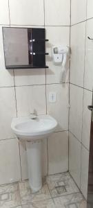 Et badeværelse på Flats dos Fernandes Geribá + 22 billeder