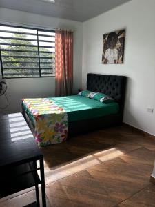 Voodi või voodid majutusasutuse Relax toas