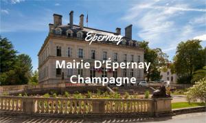 a building with a sign that reads marmite departmentemychangechange at L'atelier in Festigny