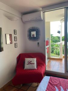 Una cama o camas en una habitación de Tahiti in Tartane