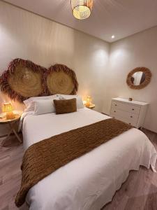 Ένα ή περισσότερα κρεβάτια σε δωμάτιο στο COSY-STAY1 Apartment Chefchaouen