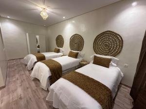 Ένα ή περισσότερα κρεβάτια σε δωμάτιο στο COSY-STAY1 Apartment Chefchaouen +5 φωτογραφίες