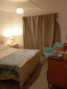 Ένα ή περισσότερα κρεβάτια σε δωμάτιο στο Complejo La Emilce