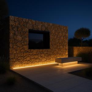 a stone wall with a television on top of it at Azulik Corsica in Corbara