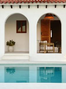 a villa with a swimming pool and a house at Casa Mimo Altea in Altea +33 photos
