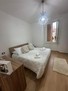 Ένα ή περισσότερα κρεβάτια σε δωμάτιο στο Casa Orchidea +9 φωτογραφίες