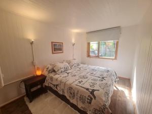 Voodi või voodid majutusasutuse Tu Casa familiar ideal, centrica en Lican Ray toas