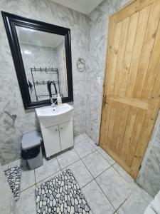 Vannituba majutusasutuses Tu Casa familiar ideal, centrica en Lican Ray