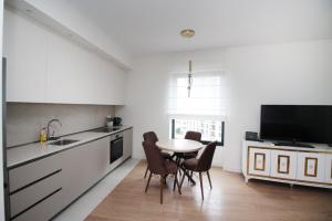 Η κουζίνα ή μικρή κουζίνα στο Aqua Lux Apartment BW