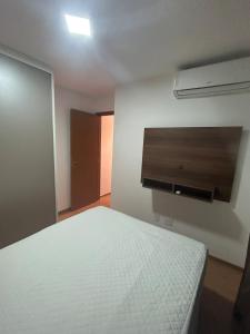 Ένα ή περισσότερα κρεβάτια σε δωμάτιο στο Apt Vista Mar Completo próx Praias da litoranea