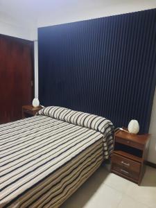 Ένα ή περισσότερα κρεβάτια σε δωμάτιο στο Constitucion2G