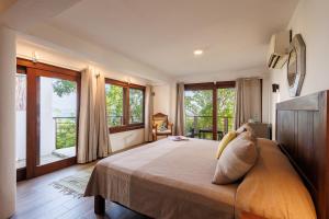 Ένα ή περισσότερα κρεβάτια σε δωμάτιο στο Casa Kalmar