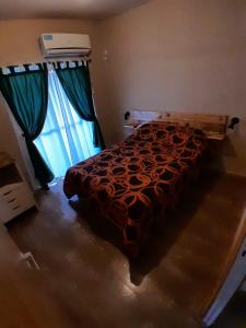 En eller flere senge i et værelse på La Casita de Caeiro