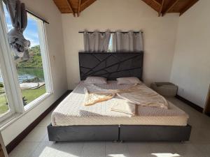 Postel nebo postele na pokoji v ubytování Finca Vista Hermosa