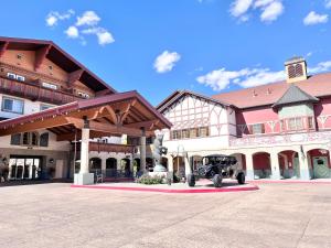 a car parked in front of a large building at Cozy King Suite in Downtown Midway Near Park City Ski Resorts - 207 in Mound City
