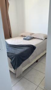 Voodi või voodid majutusasutuse Apto 2 quarto Completo com Vaga toas