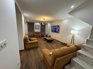 Posezení v ubytování Villa Segny Chalet