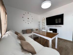 TV a/nebo společenská místnost v ubytování Casa las Cordobesas alojamiento rural