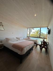 Ένα ή περισσότερα κρεβάτια σε δωμάτιο στο Hotel Casa Surf