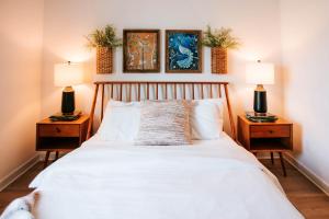 a bedroom with a bed with two night stands at Mid-Term Discounts - Near Downtown, UGA, Hospital in Athens