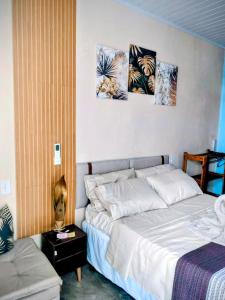 Postel nebo postele na pokoji v ubytování Villa jujubas da vovó