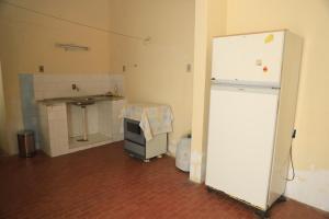 Kuchyň nebo kuchyňský kout v ubytování Casa Rústica e Aconchegante em Camocim + 5 fotografií