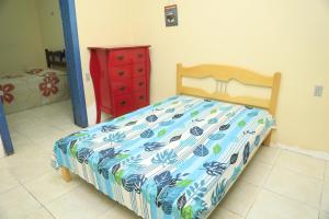 Postel nebo postele na pokoji v ubytování Casa Rústica e Aconchegante em Camocim