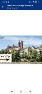 a screenshot of a website with a picture of a city at Studio des Trois Frontières in Saint-Louis